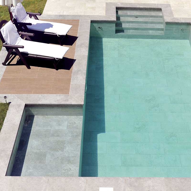 Pool with stairs, platforms and other details
