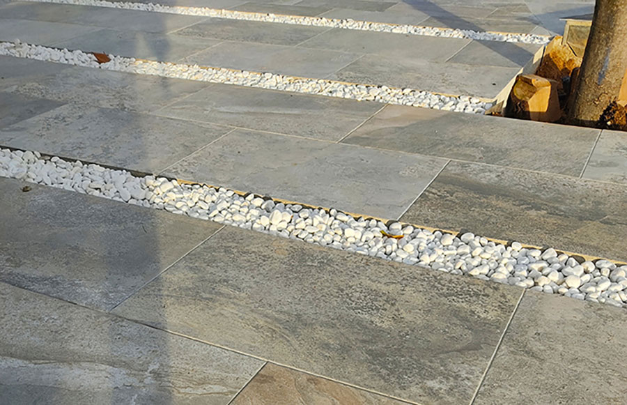Which outdoor flooring heats up the least in the sun? Absorptance